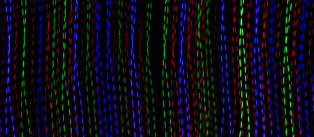 colored lines on a black background. texturaの写真素材
