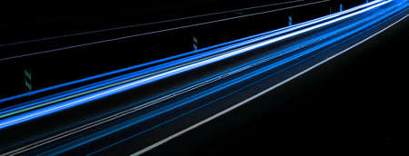 blue car lights at night. long exposureの写真素材