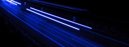 blue car lights at night. long exposure