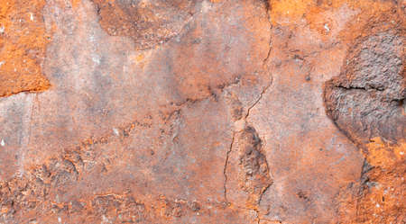 macro photo of an orange brick with visible texture. backgroundの写真素材