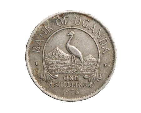 A Uganda coin shilling on a white isolated backgroundの写真素材