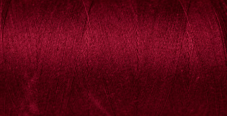 red cotton threads with visible details. backgroundの写真素材