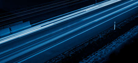 blue car lights at night. long exposureの写真素材