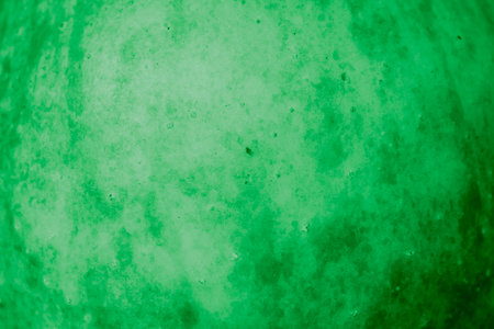 green apple skin with visible details. backgroundの写真素材
