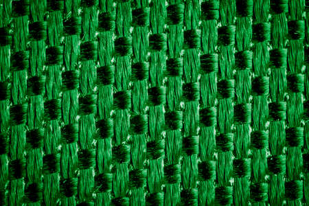 green fabric with a visible texture. backgroundの写真素材