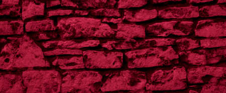 red limestone wall with visible details. backgroundの写真素材