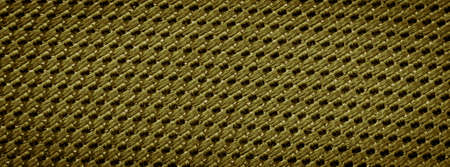gold fabric with a visible texture. backgroundの写真素材