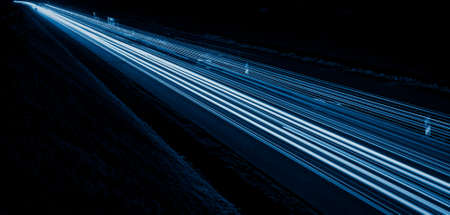 blue car lights at night. long exposureの写真素材