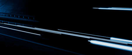 blue car lights at night. long exposureの写真素材