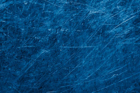 scratched blue metal sheet with visible texture. backgroundの写真素材