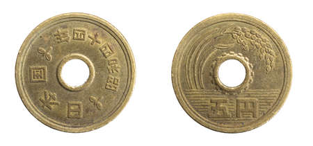Japan five yen coin on white isolated backgroundの写真素材