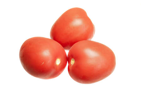 red tomatoes on a white isolated backgroundの写真素材
