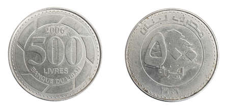 Lebanon five hundred livres coins on a white isolated isolated backgroundの写真素材