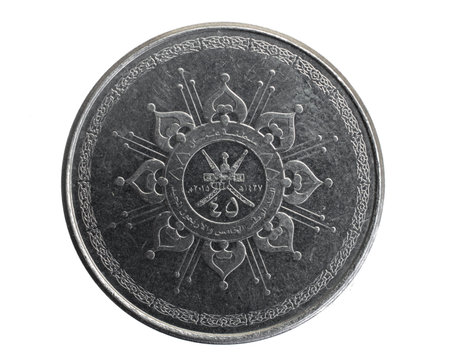 Oman fifty baisa coin on a white isolated backgroundの写真素材