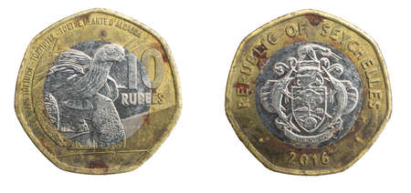 Seychelles ten rupees coin on a white isolated backgroundの写真素材