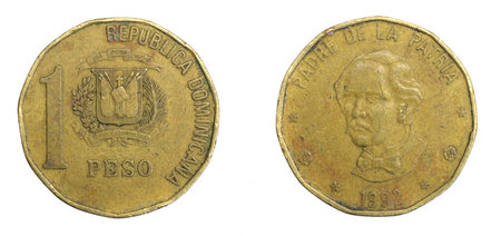 Dominicana one peso coin on a white isolated backgroundの写真素材