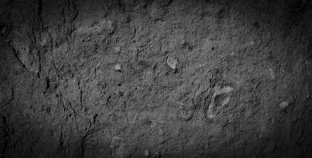 macro photo of black brick with visible texture. backgroundの写真素材