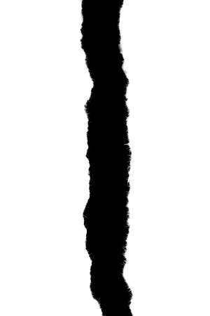 a white piece of paper on a black isolated backgroundの写真素材