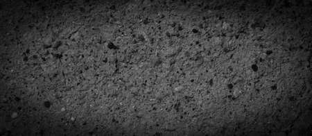 macro photo of black brick with visible texture. backgroundの写真素材