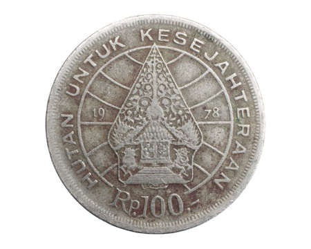 Indonesia one hundred rupiah coin on white isolated backgroundの写真素材