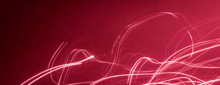 white light lines on a red backgroundの写真素材
