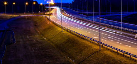 lights of moving cars at night. long exposureの写真素材