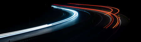 abstract red car lights at night. long exposureの写真素材