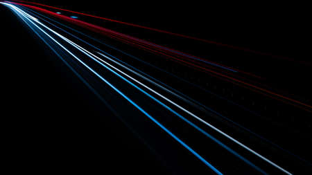 abstract red car lights at night. long exposureの写真素材