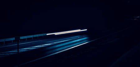 abstract red car lights at night. long exposureの写真素材