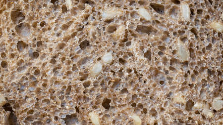 dark bread with sunflower seeds. background or texturaの写真素材