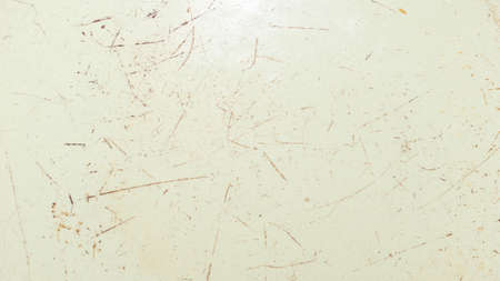 old sheet metal painted yellow with visible rustの写真素材