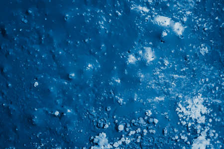 old wall painted blue color. background or textura