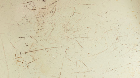 old sheet metal painted yellow with visible rustの写真素材