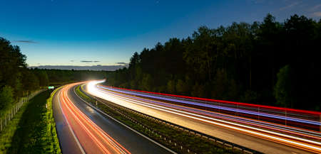 lights of moving cars at night. long exposureの写真素材