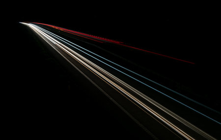 abstract red car lights at night. long exposureの写真素材