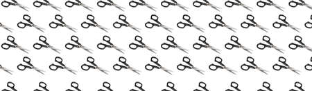 scissors with a black handle on a white backgroundの写真素材