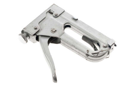 foil construction stapler and a white isolated backgroundの写真素材