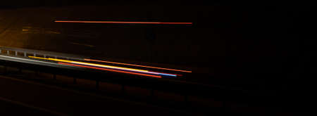 lights of moving cars at night. long exposureの写真素材