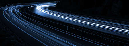 blue car lights at night. long exposureの写真素材