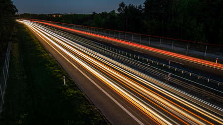 lights of moving cars at night. long exposureの写真素材