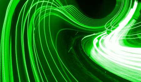 green car lights at night. long exposureの写真素材