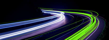 green car lights at night. long exposureの写真素材