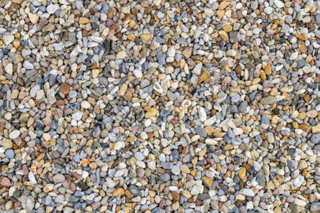 colored pebbles with visible details. background or texturaの写真素材