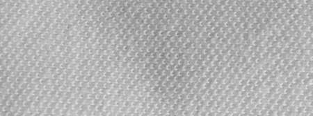 white cotton material with a visible texture. backgroundの写真素材