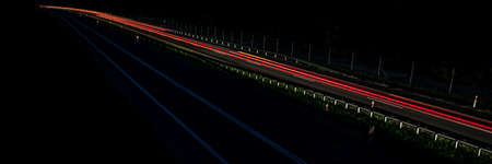 lights of moving cars at night. long exposureの写真素材