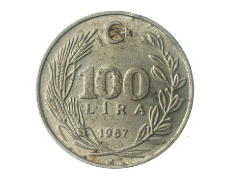 Turkey 100 lira coin on a white isolated backgroundの写真素材