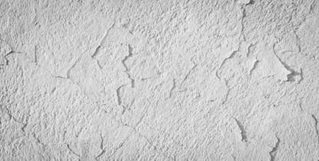 Wall with white paint peeling off. backgroundの写真素材