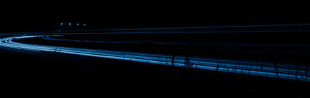 blue car lights at night. long exposureの写真素材
