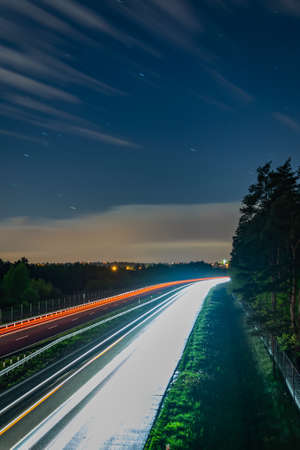 lights of moving cars at night. long exposureの写真素材