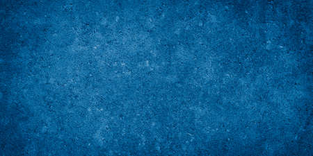 the wall is painted with blue paint with visible detailsの写真素材